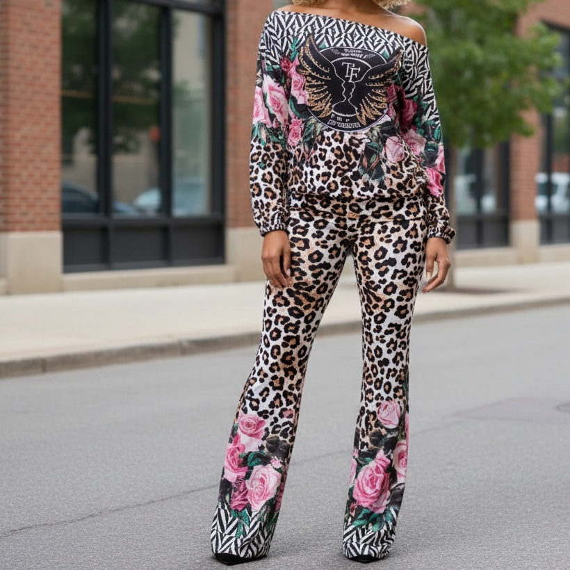 ENSEMBLE 2 Pièces de Chez TATU 9006 ultra tendance, composé d’un haut épaules dénudées et d’un pantalon fluide. Mélange d’imprimés léopard, floral et graphique pour un look audacieux, chic et moderne. Idéal sortie, soirée ou look casual stylé.