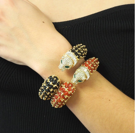 NIIKI PARIS Jonc leo noir et marron à une tête ( poignet 17 cm) Tout les bijoux NIIKI indisponibles sont en précommande dans un délai de 15 jours ouvrables voir en privé avec Laetitia .