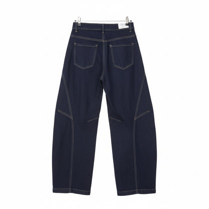Jean barrel YW1587J – jean balloon femme en denim brut sombre, taille haute asymétrique croisée, jambes larges arrondies et surpiqûres contrastées, style streetwear chic pour le quotidien