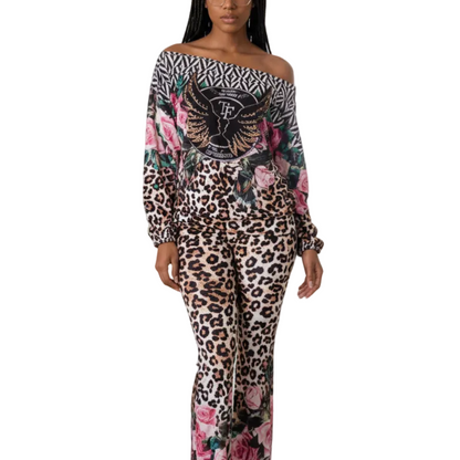 9006 TATU Ensemble femme 2 pièces ultra-tendance composé d’un haut épaules dénudées et d’un pantalon fluide. Mélange d’imprimés léopard, floral et graphique pour un look audacieux, chic et moderne. Idéal sortie, soirée ou look casual stylé.
