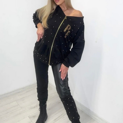 0048 PAPARAZZI Ensemble jogging veste pantalon en bi-matière veste avec fermeture éclair, très évasée sur les épaules, pantalon resserré en bas Sweat et similicuir avec strass et perles