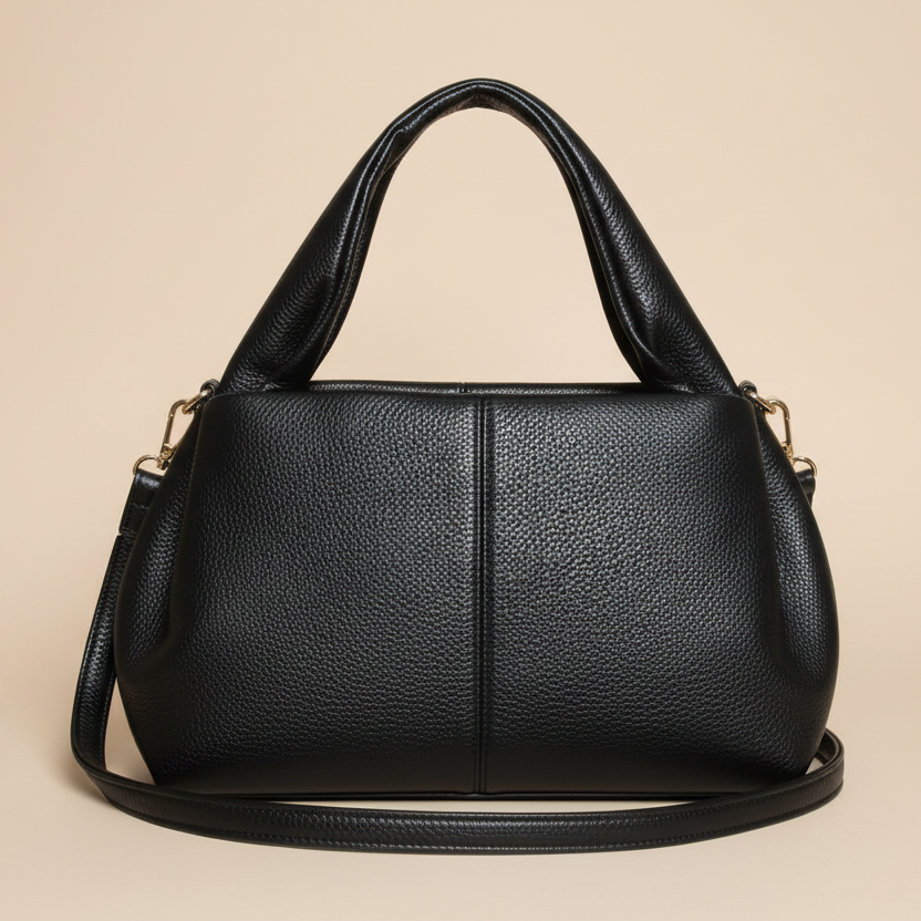 1068 SAC en simili, cuir, bonne qualité avec une anse et une bandoulière se ferment par fermeture éclair,30 cm de largeur 18 cm de hauteur et 12 cm de profondeur