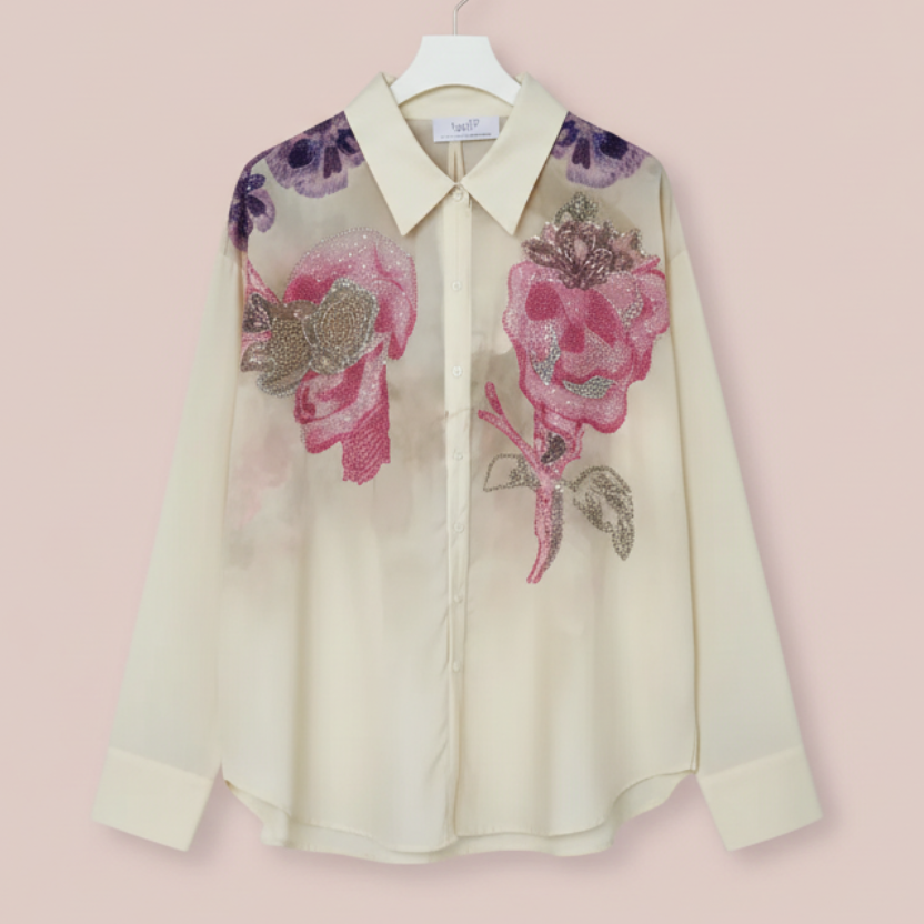 Chemise artistique 409 – chemisier femme Missy en voile transparent, motifs de crânes stylisés roses et violets, strass et paillettes, coupe fluide à col classique pour un look rock chic