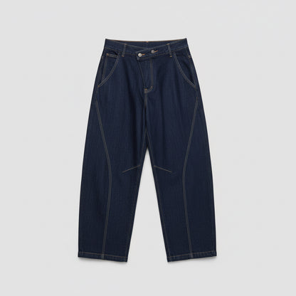 Jean barrel YW1587J – jean balloon femme en denim brut sombre, taille haute asymétrique croisée, jambes larges arrondies et surpiqûres contrastées, style streetwear chic pour le quotidien