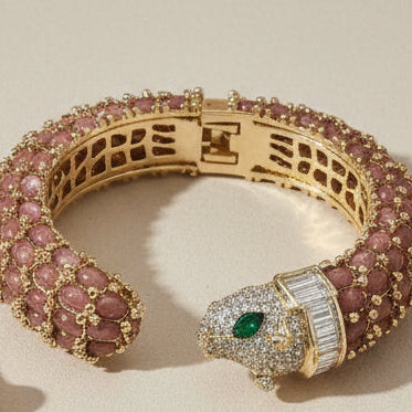 NIIKI PARIS Jonc leo noir et marron à une tête ( poignet 17 cm) Tout les bijoux NIIKI indisponibles sont en précommande dans un délai de 15 jours ouvrables voir en privé avec Laetitia .